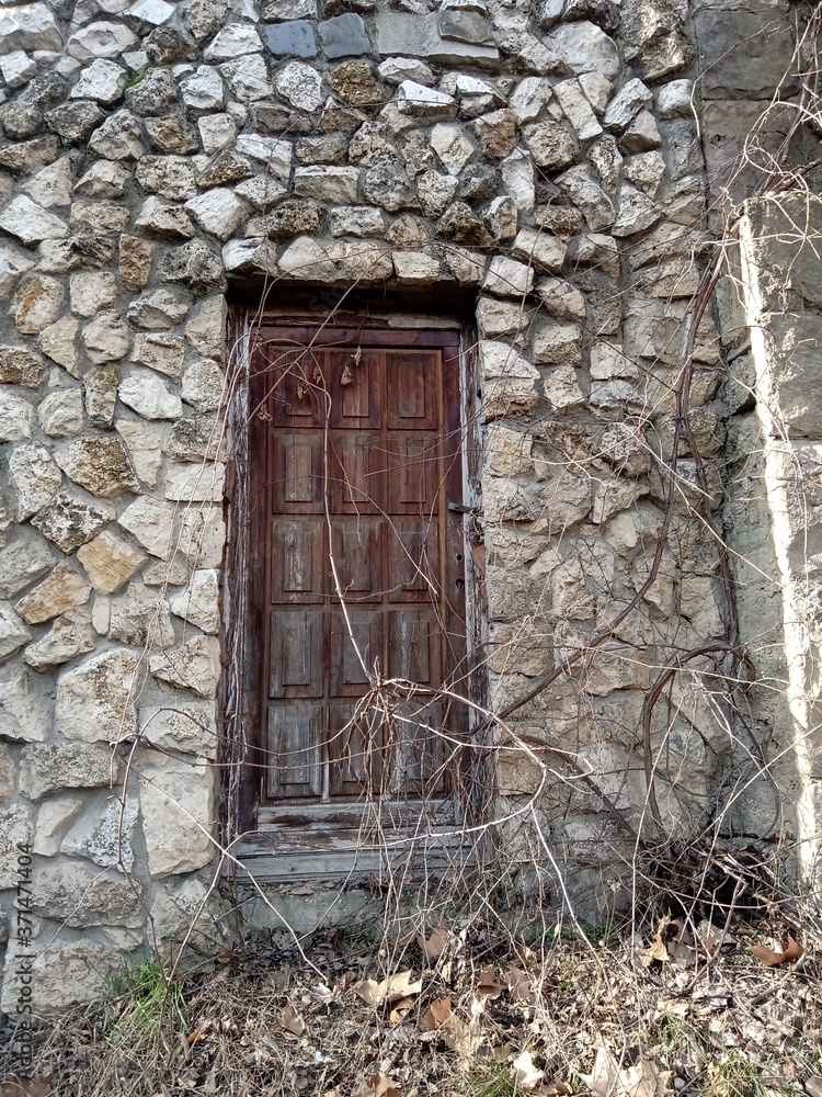 Stone building with wooden door