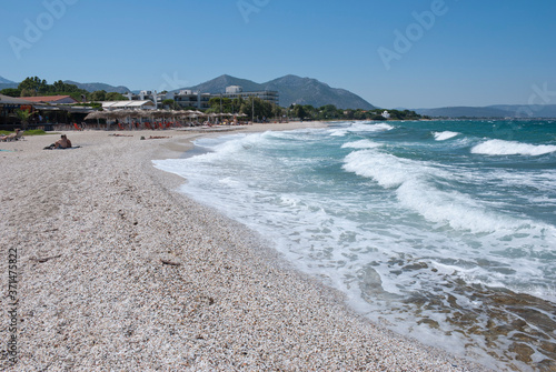 Athens  Greece  August 2020  Beautiful pebbled beach and stormy sea waters