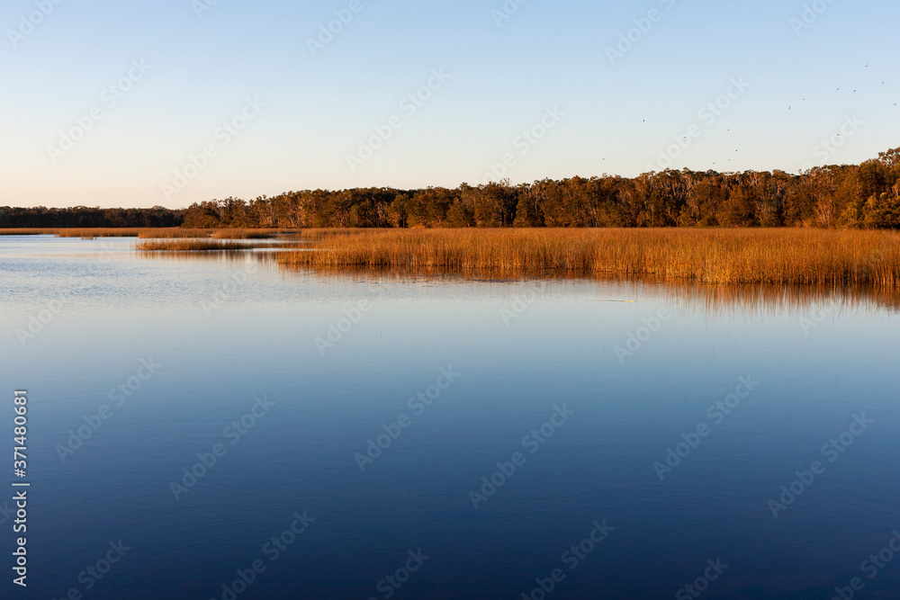 Scenic view of calm lake Scenic view of calm lake