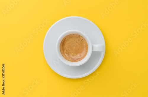 espresso coffee on yellow background