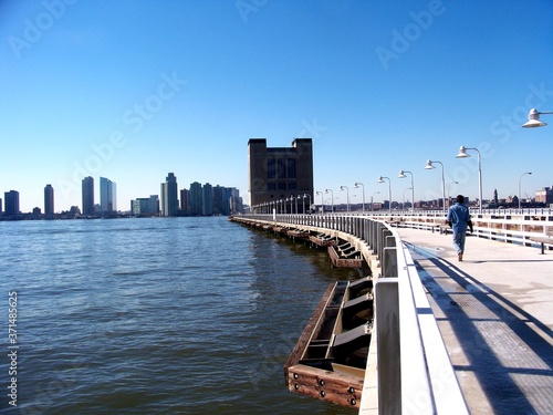 Concrete pier with tall lamps. Pier on the Hudson River © Anastasia_Kot