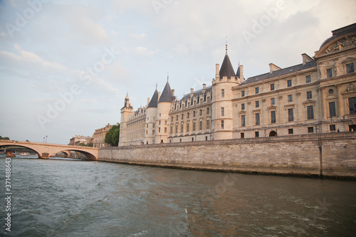 Palais de Justice standing on the banks of river Seine on the Ile de la Cite, Paris - France.