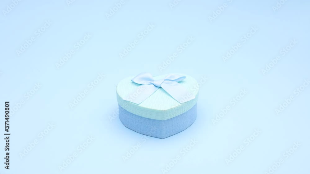 Blue gift appear and open on blue theme. Birthday stop motion Blue gift appear and open on blue theme. Birthday stop motion