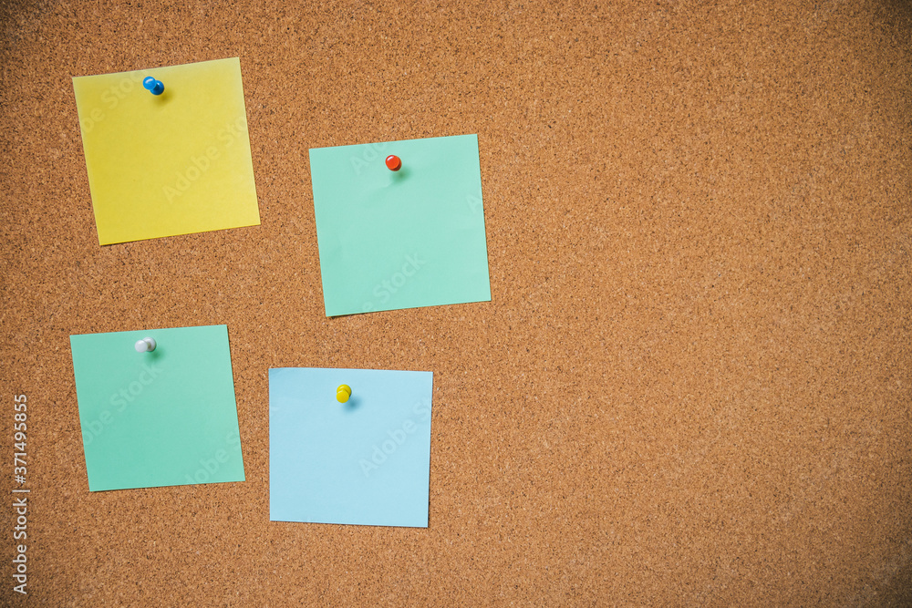 Coloreful sheets of note papers on wooden background. Coloreful sheets of note papers on wooden background.
