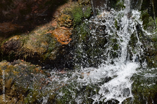 Splashing waterfall on rock