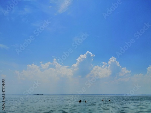 Rest by the river under the blue sky