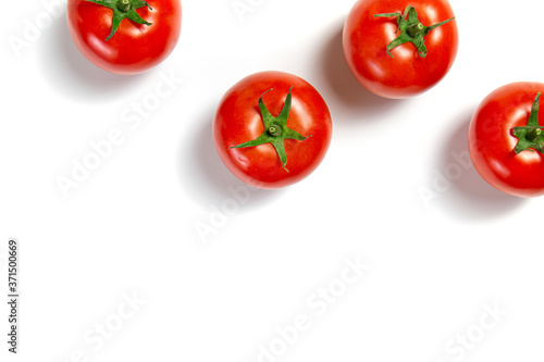 tomatoes on a white background © Nicole Cook