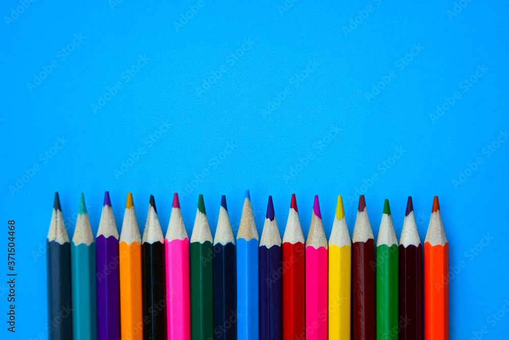 Colorful on blue background. School concept Colorful on blue background. School concept
