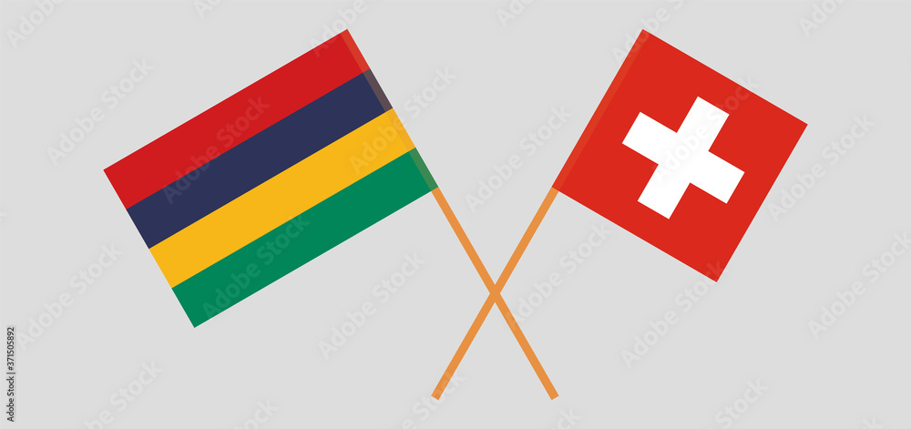Crossed and waving flags of Mauritius and Switzerland