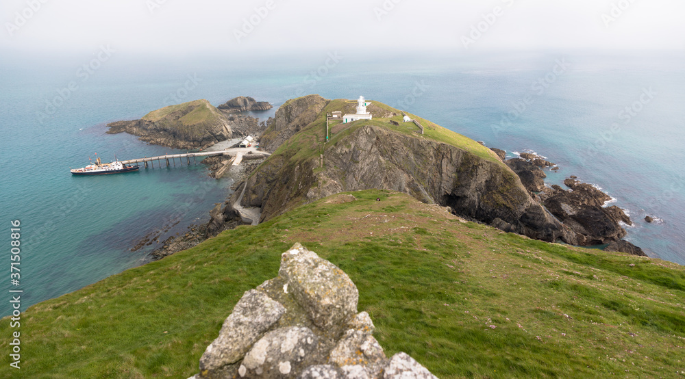 Views of the southern end of Lundy Island with a misty sky, The Bristol Channel, Devon, UK