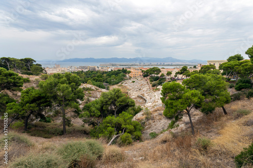 Roman Amphitheatre of Cagliari on a cloudy summer day