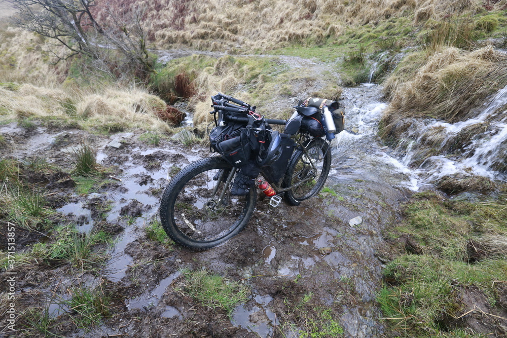 bikepacking through a bog in Wales. bikepacking through a bog in Wales.