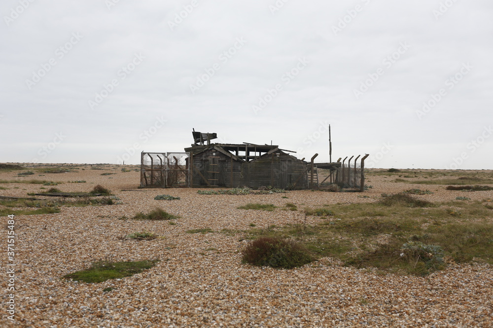 Abandoned building on the beach in Dungeness. 