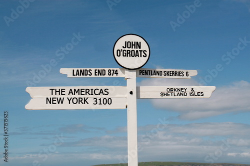 road sign showing lands end to john o groats  and the scotish islands to new york and the americas photo