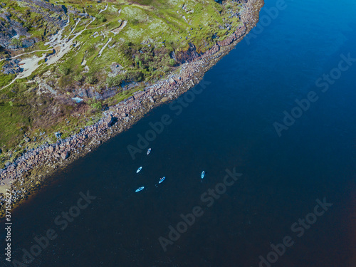 Aerial view of people surfing along bank ofÔøΩTeriberka River