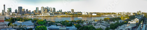 Panorama of Brisbane city CBD surrounded by waters of Brisbane river
