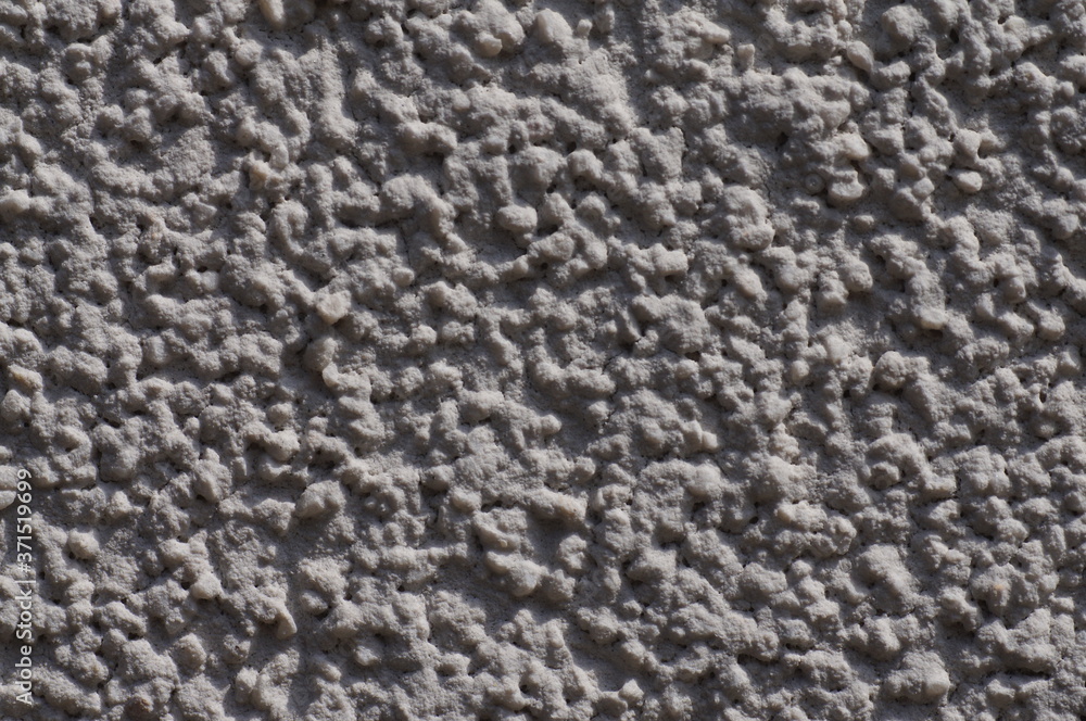 External facade of the building, plaster with clear texture, abstract background to text