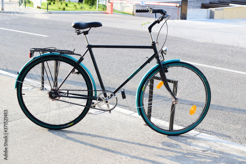 Green city bike on street, pedal, bicycle