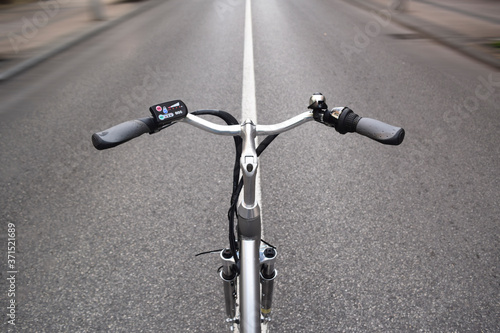 electric bicycle in motion wheel on the street, e-bike, city bike