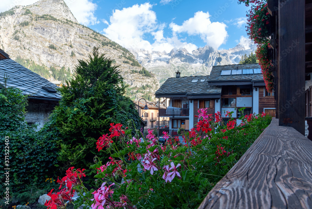Old center of Courmayeur with a view of Mont Blanc - Valle d'Aosta - Italy