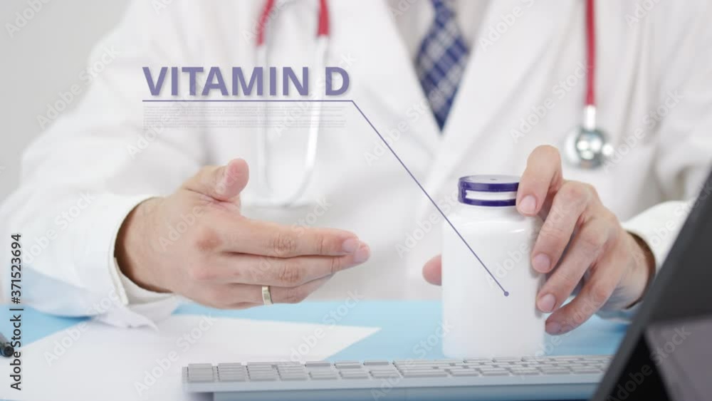 Doctor describing some a generic VITAMIN D to a patient Doctor describing some a generic VITAMIN D to a patient