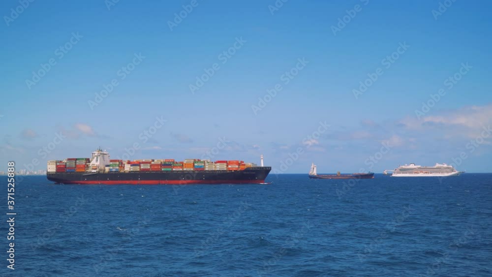 Fort Lauderdale, Florida 4.12.20: Maersk Line cargo ship on anchor at sea, cruise ship and vessel Fort Lauderdale, Florida 4.12.20: Maersk Line cargo ship on anchor at sea, cruise ship and vessel