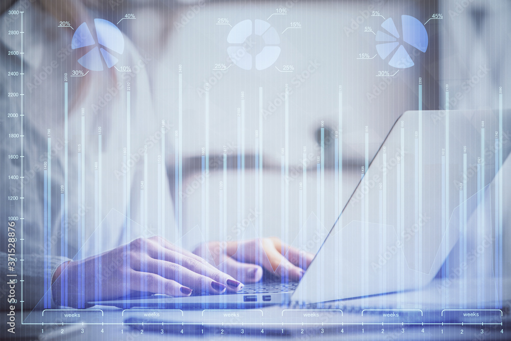 Double exposure of woman hands working on computer and forex graph hologram drawing. Financial analysis concept. Double exposure of woman hands working on computer and forex graph hologram drawing. Financial analysis concept.