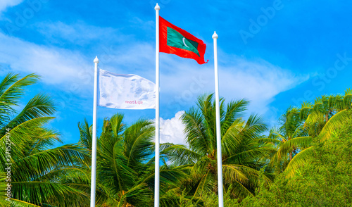 Maldives national flag on blue sky background