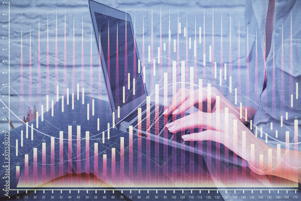 Multi exposure of woman hands typing on computer and forex chart hologram drawing. Stock market analysis concept. Multi exposure of woman hands typing on computer and forex chart hologram drawing. Stock market analysis concept.
