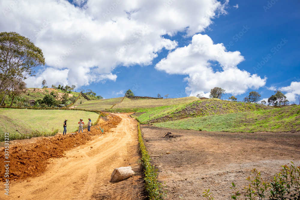 Llano Grande, Antioquia / Colombia November 15, 2018 Workers in a road construction. 