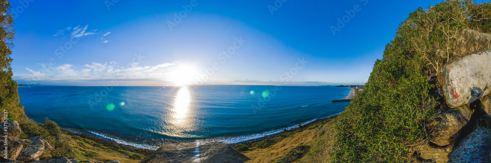 Panoramic view of sun over the ocean horizon
