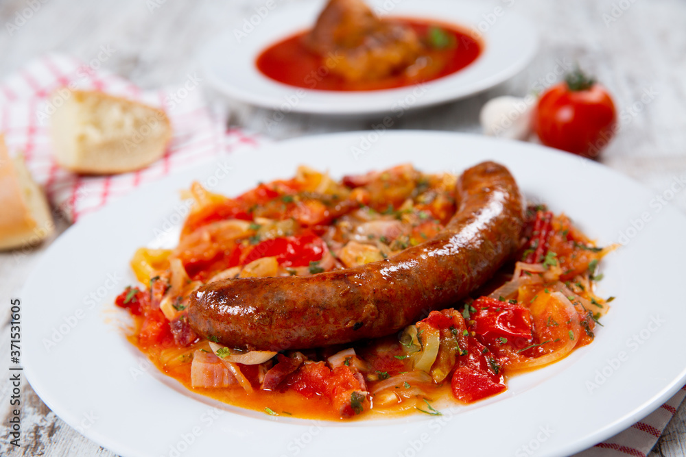 Sausage with vegetables on a plate Sausage with vegetables on a plate