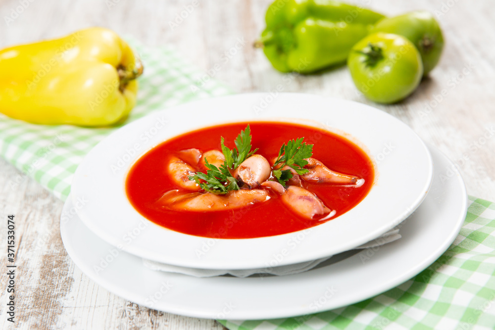 Tomato soup with squid