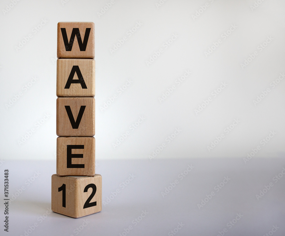 Symbol for a second wave of the corona virus. Cube with the changed the expression '1 wave' to '2 wave'. Copy space. Beautiful white background. Symbol for a second wave of the corona virus. Cube with the changed the expression '1 wave' to '2 wave'. Copy space. Beautiful white background.