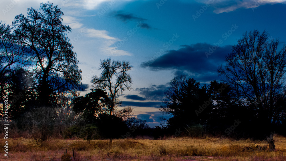 A Dramatic Sky at Blue Hour Over an Autumn Field