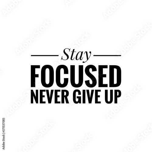 ''Stay focused, never give up'' sign for motivational quote