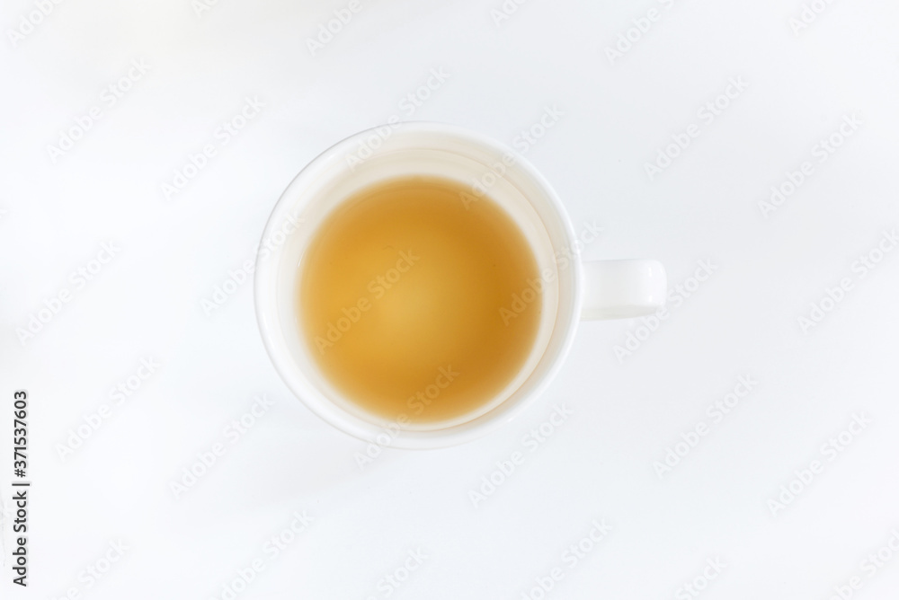 White half-empty coffee cup on white background, isolated, close up, above vantage point photography White half-empty coffee cup on white background, isolated, close up, above vantage point photography