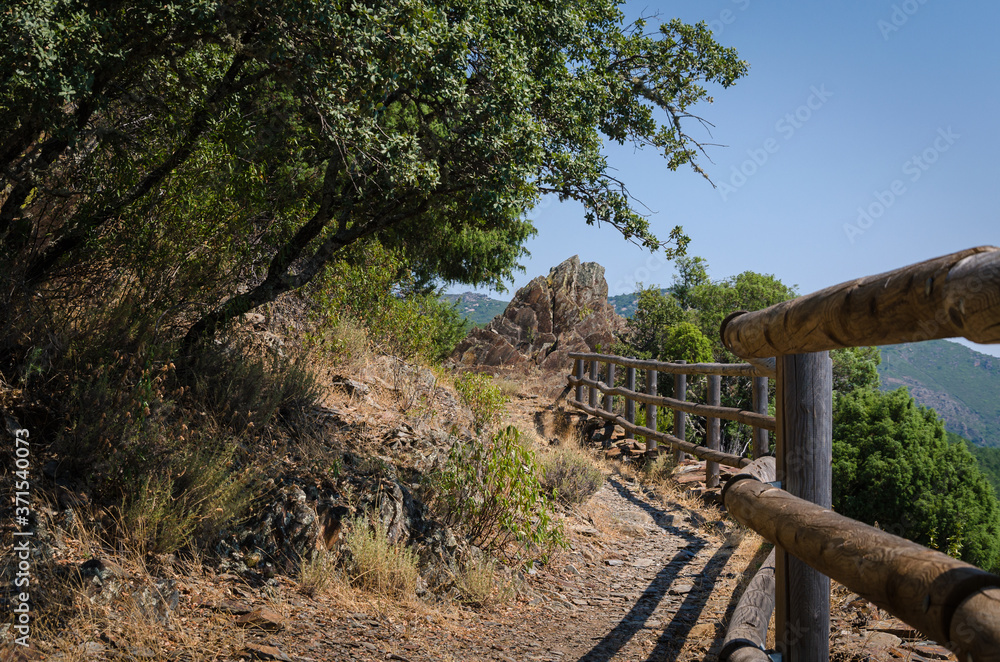 A path through the natural environment of the meander of Melero, Riomalo de Abajo, Cáceres, Spain A path through the natural environment of the meander of Melero, Riomalo de Abajo, Cáceres, Spain