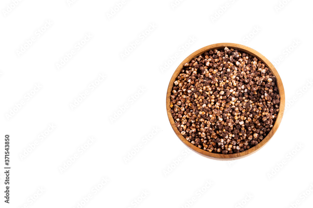 Chocolate quinoa seeds in the wooden bowl Chocolate quinoa seeds in the wooden bowl