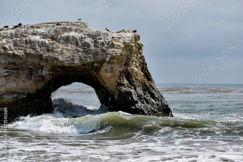 Waves crashing on cliffs