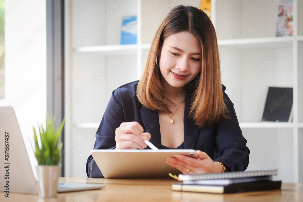 Business women work from home living room enjoying sunny morning on the day with documents and laptop people Consulting and business planning. Business women work from home living room enjoying sunny morning on the day with documents and laptop people Consulting and business planning.
