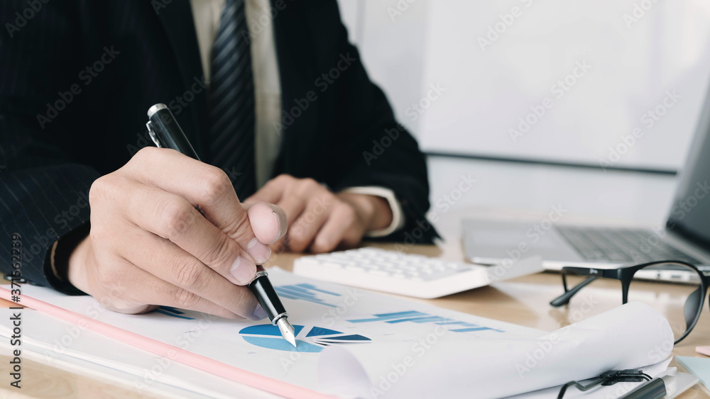 businessmen have analysis the chart, set targets for new management success. businessmen have analysis the chart, set targets for new management success.