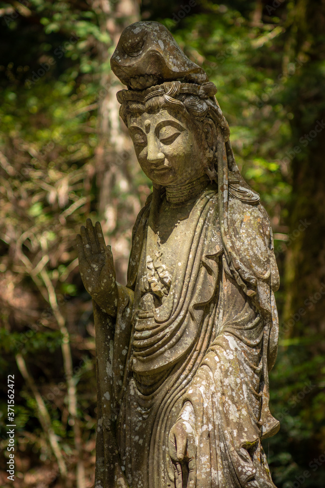 Buddhist sculpture in the Okunoin cemetery in Koyasan Mount Koya, UNESCO world heritage site and a 1200 years old center of Japanese sect of of Shingon Buddhism in Wakayama Japan