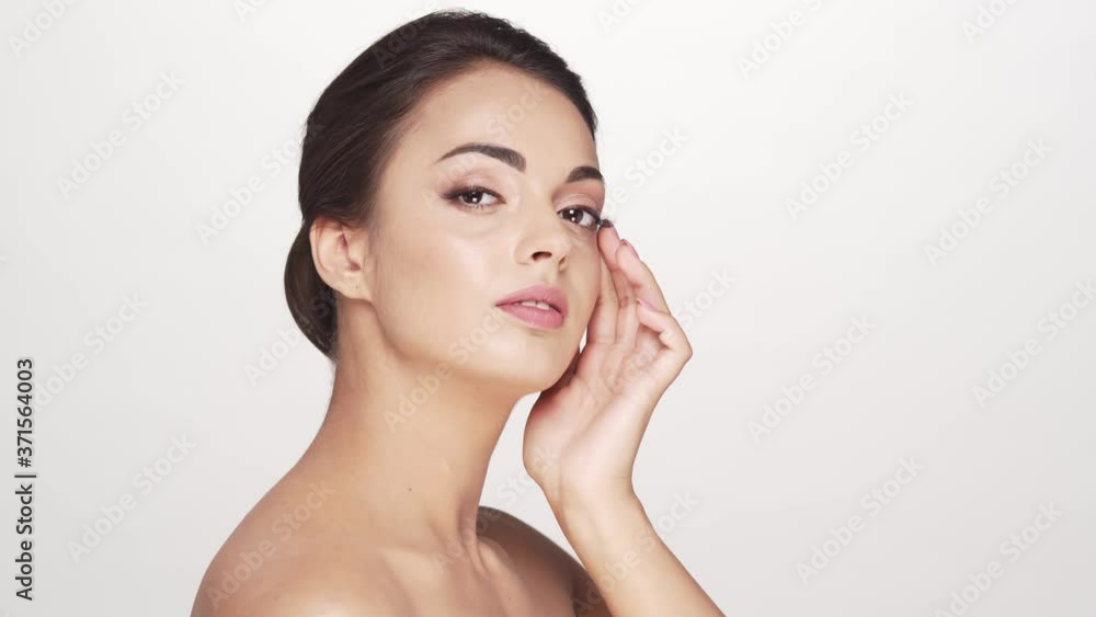 Studio portrait of young and beautiful brunette woman Studio portrait of young and beautiful brunette woman