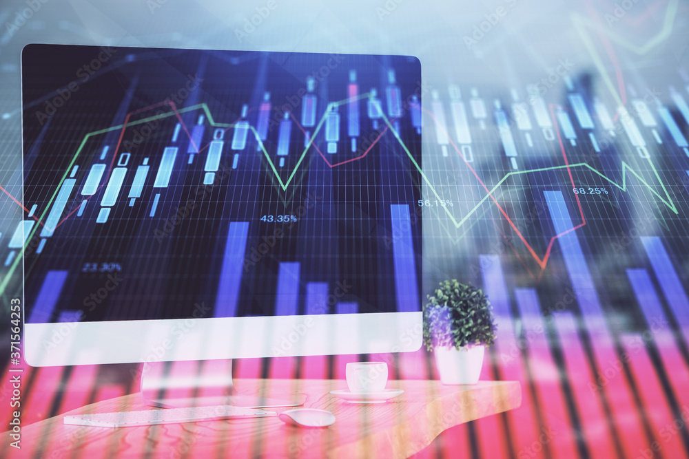 Stock market chart hologram drawn on personal computer background. Double exposure. Concept of investment. Stock market chart hologram drawn on personal computer background. Double exposure. Concept of investment.