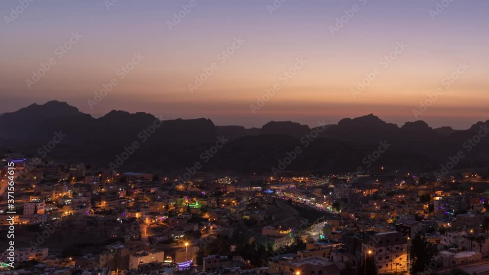 Petra and Wadi Musa City by Night (time lapse pan shot) Petra and Wadi Musa City by Night (time lapse pan shot)