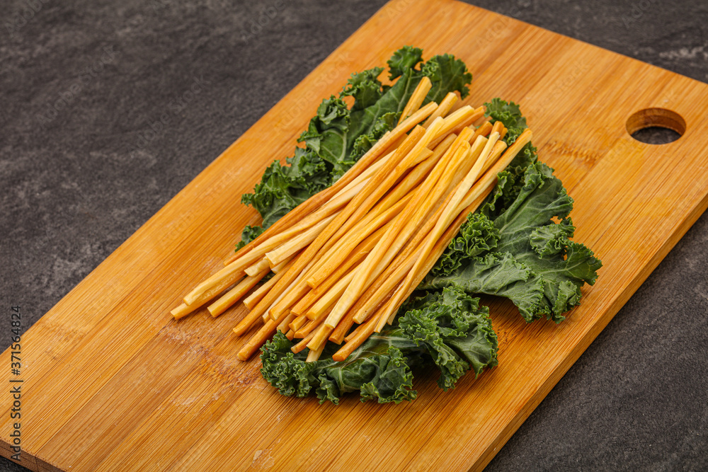 Chechel cheese sticks over board Chechel cheese sticks over board