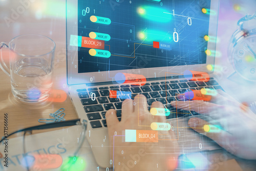 Businessman with computer background with technology theme hologram. Concept of big data. Double exposure.