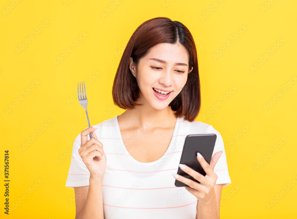 happy young woman searching for restaurant by smart mobile phone concepts happy young woman searching for restaurant by smart mobile phone concepts