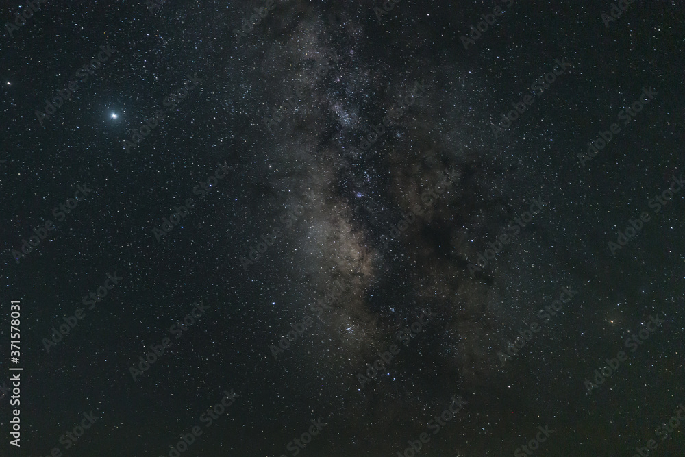 Fototapeta premium Night landscape of the star sky with milky way among the desert, Inner Mongolia, Northwest of China